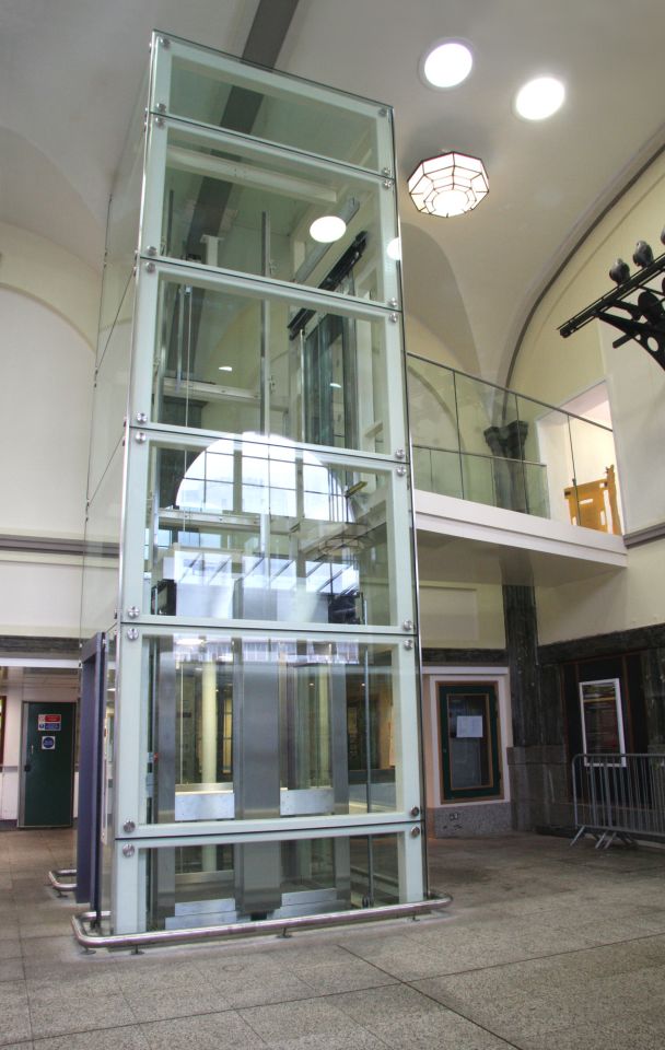 A scenic passenger lift in the Art Deco ticket hall.