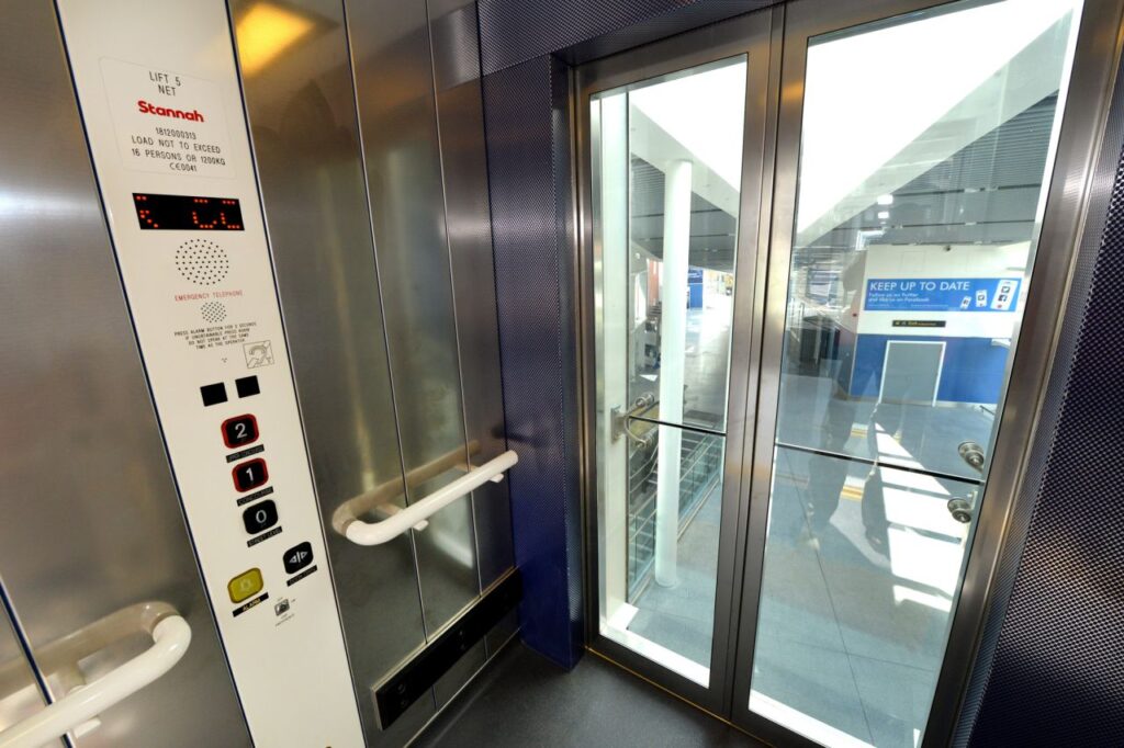 Inside a scenic passenger lift: easy-to-use controls for a safe journey.