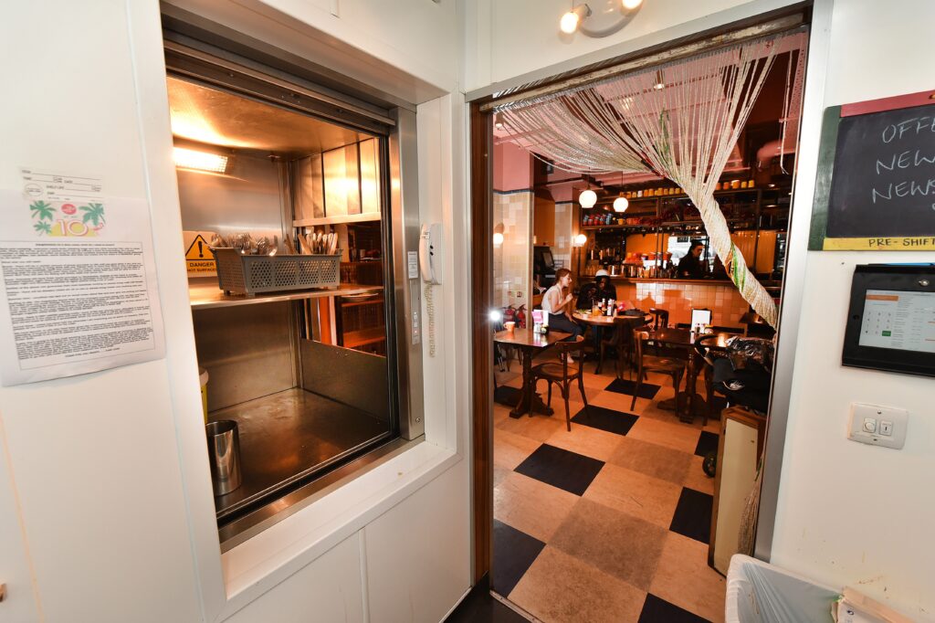 Microlift 100B service lift with adjacent entry at The Breakfast Club, London