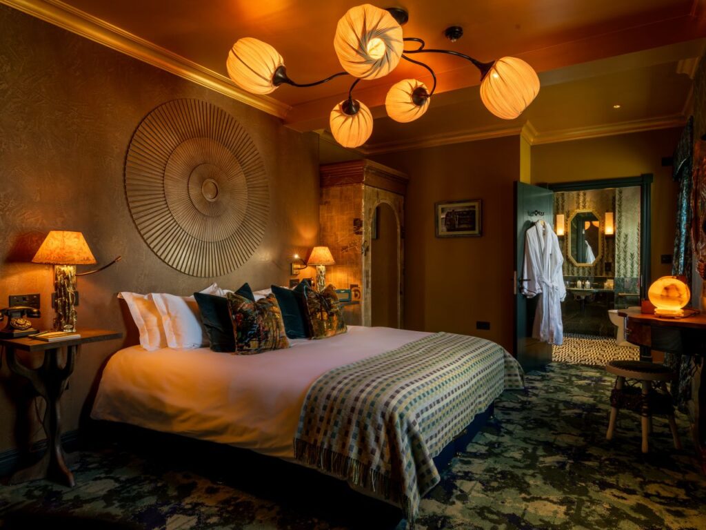 The beautifully designed Legend Room, one of 12 unique bedrooms at Ardbeg House