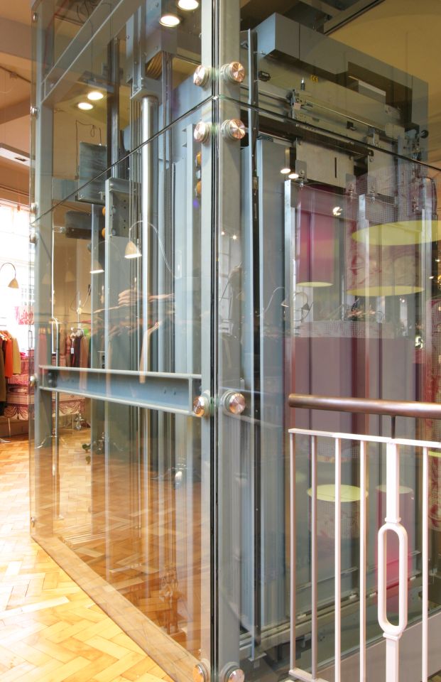 Set in a steel structure clad in 12.8mm toughened glass.