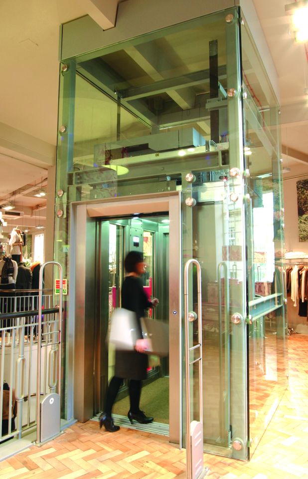 The Maxilift and decorative stair balustrades are finished in a sympathetic, soft grey harmony.