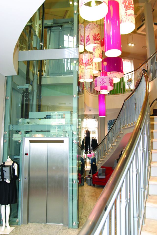 A steel and glass shaft maximised light and view of the sweeping staircase.