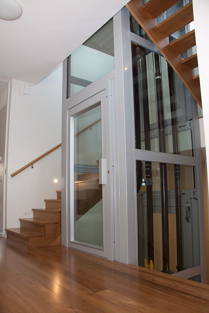 A Midilift CL in a fully glazed structure as a centrepiece to a stairwell.