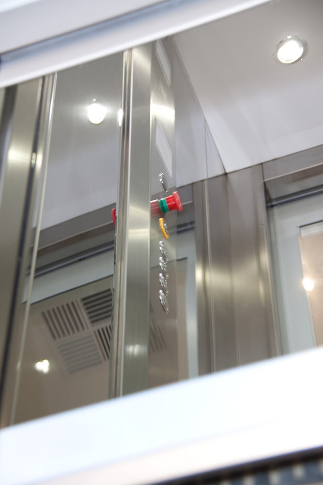 Cabin platform lift interior in glass structure.