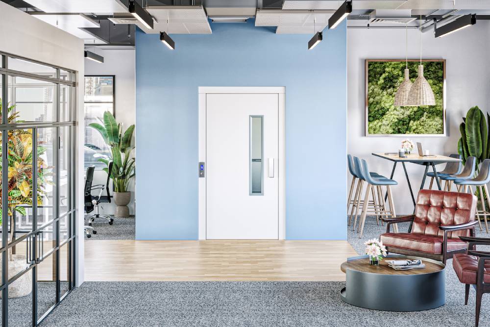 A Midilift cabin platform lift in a commercial office space