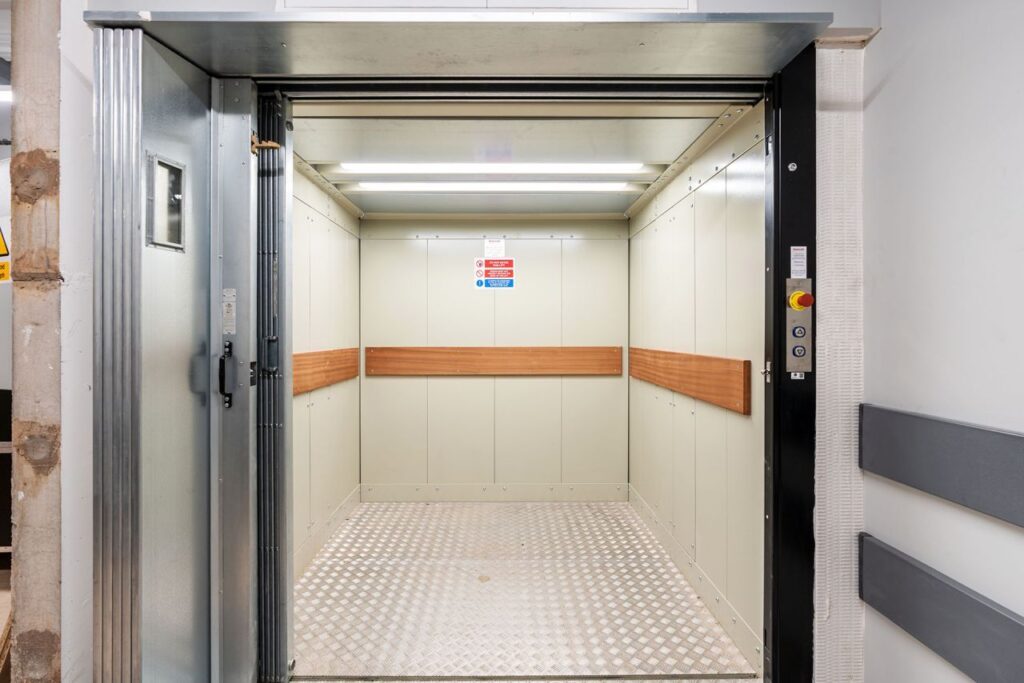 The goods lift has front-facing entrances for easy loading and unloading