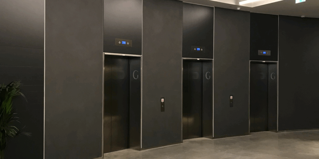 Bespoke full-depth architraves acid-etched with floor markings add a decorative touch [Image courtesy of CRBE]