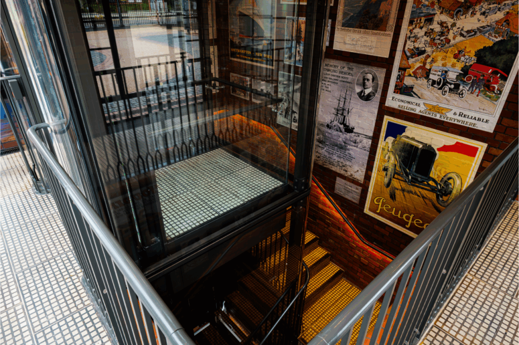 Minimalistic looking 8-person all glass lift offers unobstructed views as passengers ascend