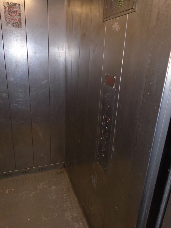 The ageing 8-person passenger lift car interior prior to the works starting