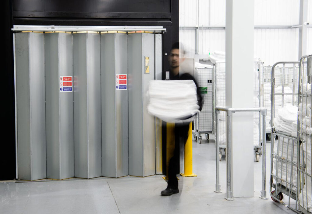 Concertina door for easy access to a Goodsmaster goods lift