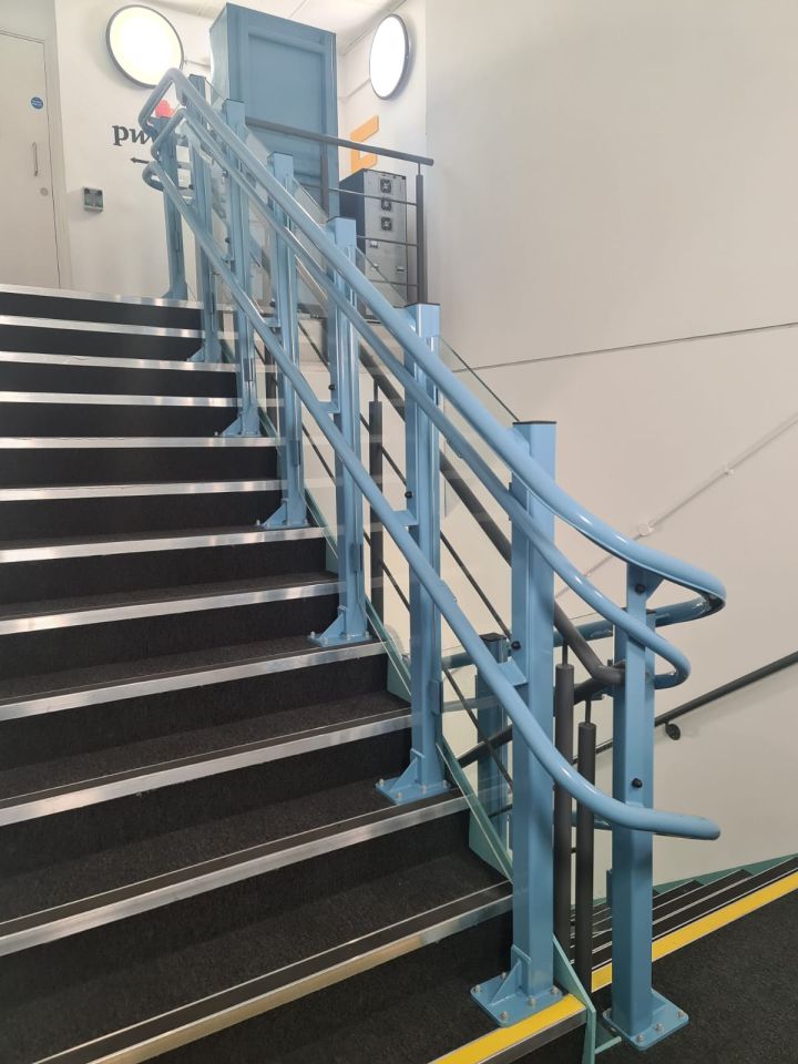 The rails continue up to the top floor, with the motor hidden neatly around a 90-degree corner.