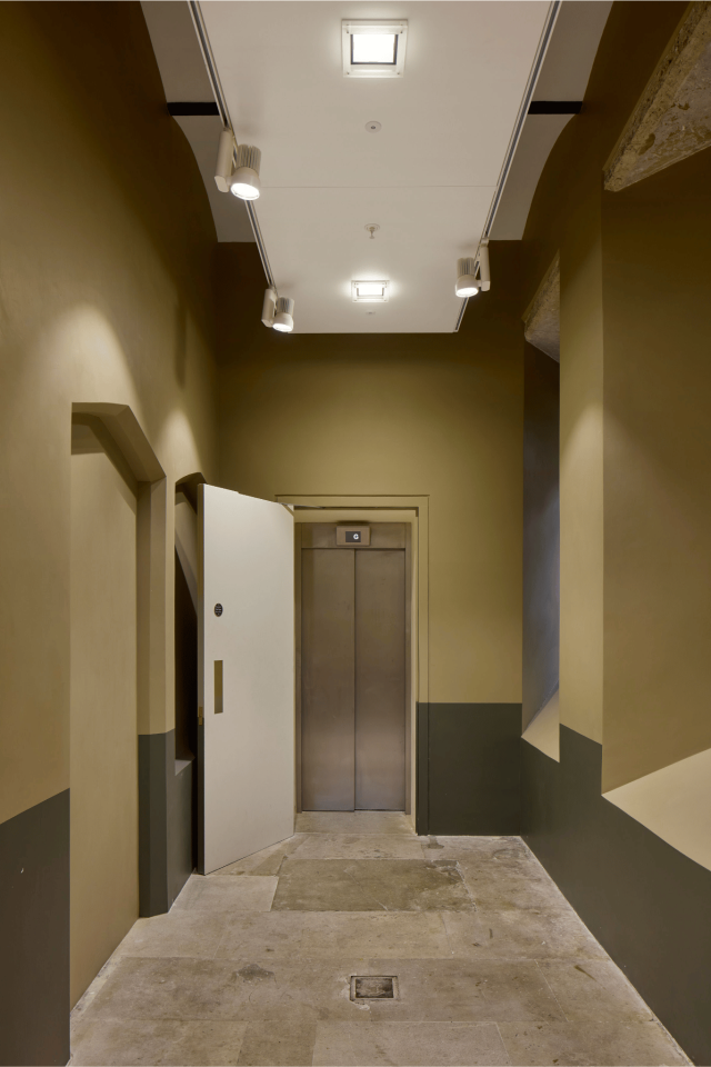 View of gearless traction drive main passenger lift at ground floor level - Elizabeth Tower, London