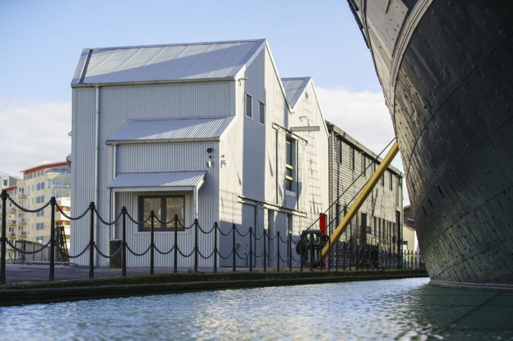 The ‘Being Brunel’ attraction with refurbished original drawing office linked to new wood-clad museum beyond, alongside the SS Great Britain.