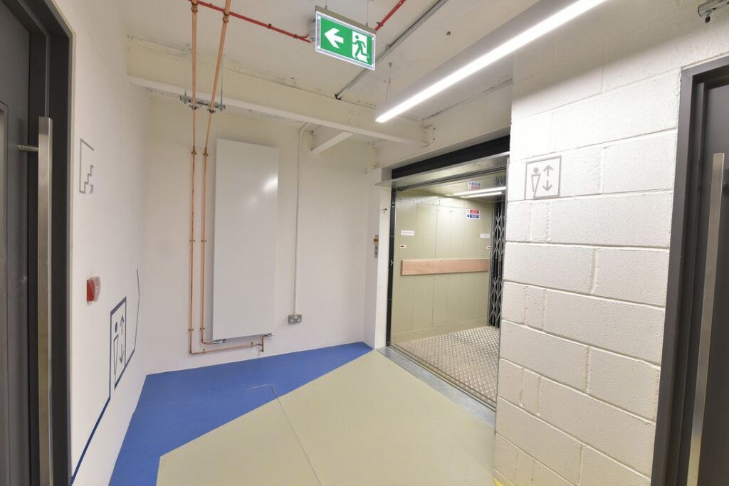 Stannah Goodsmaster 1000 CD Plus goods attendant lift in the revamped Kings House office building in Central London