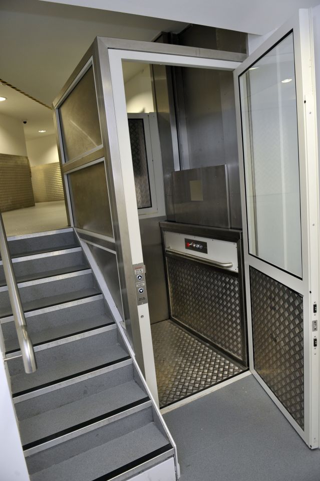 A bespoke platform lift makes light work of a change in levels in the busy back-of-house area.