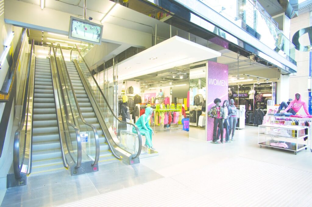 7 Stannah lift products showcase in JD Sports in Liverpool One.