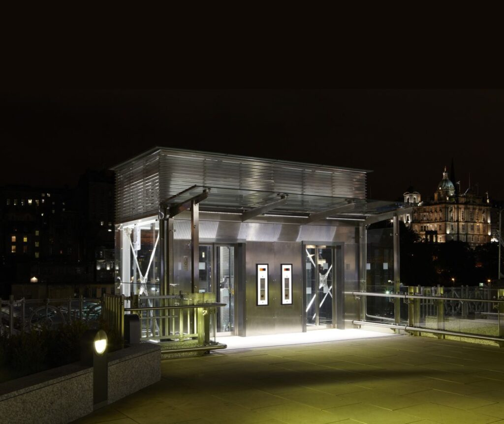What a showstopper! The passenger duplex star on the station roof/street level, floodlit at night.