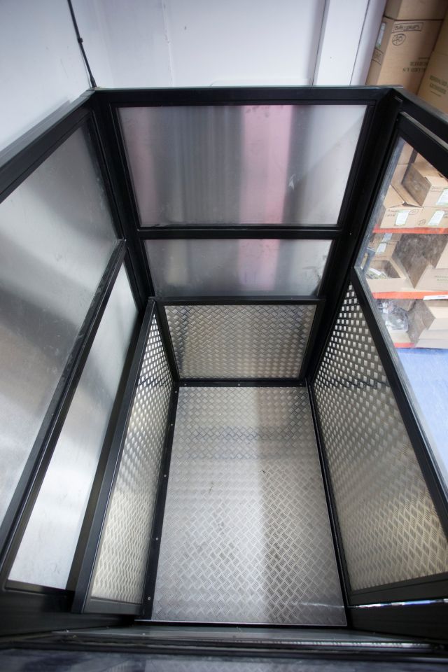 Levelmaster goods step lift in split-level Tiger storeroom