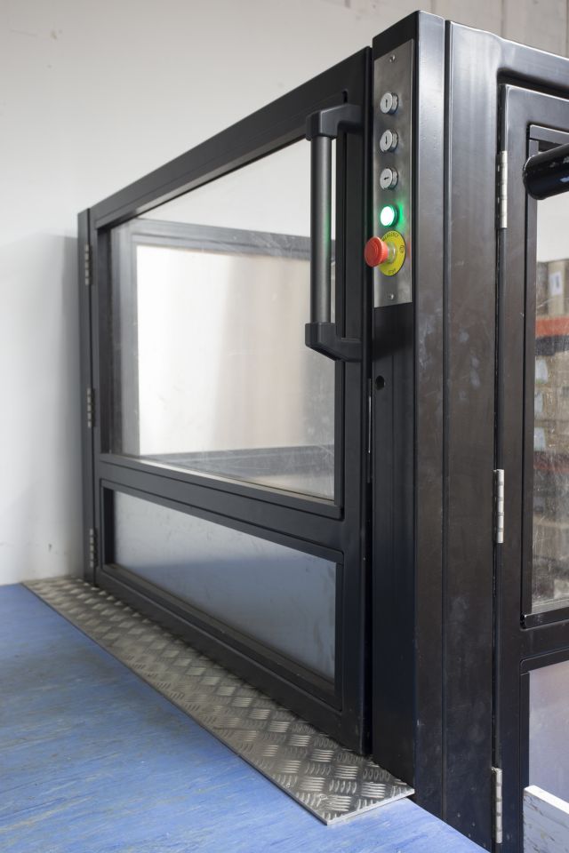 Levelmaster goods step lift in split-level Tiger storeroom