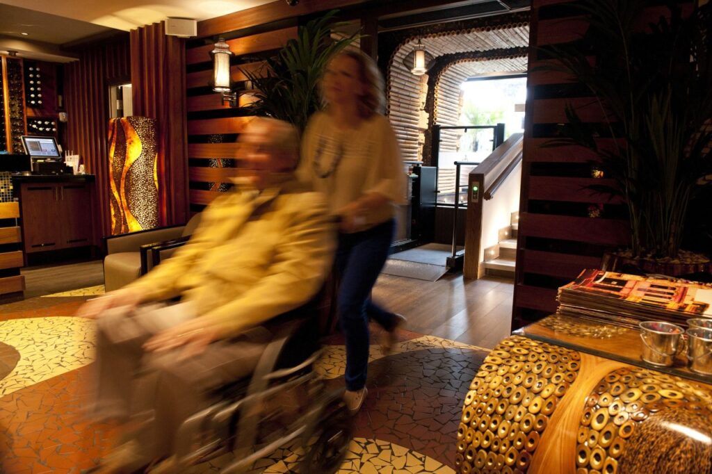 Stannah Lowriser vertical platform lift improves access in Bournemouth restaurant