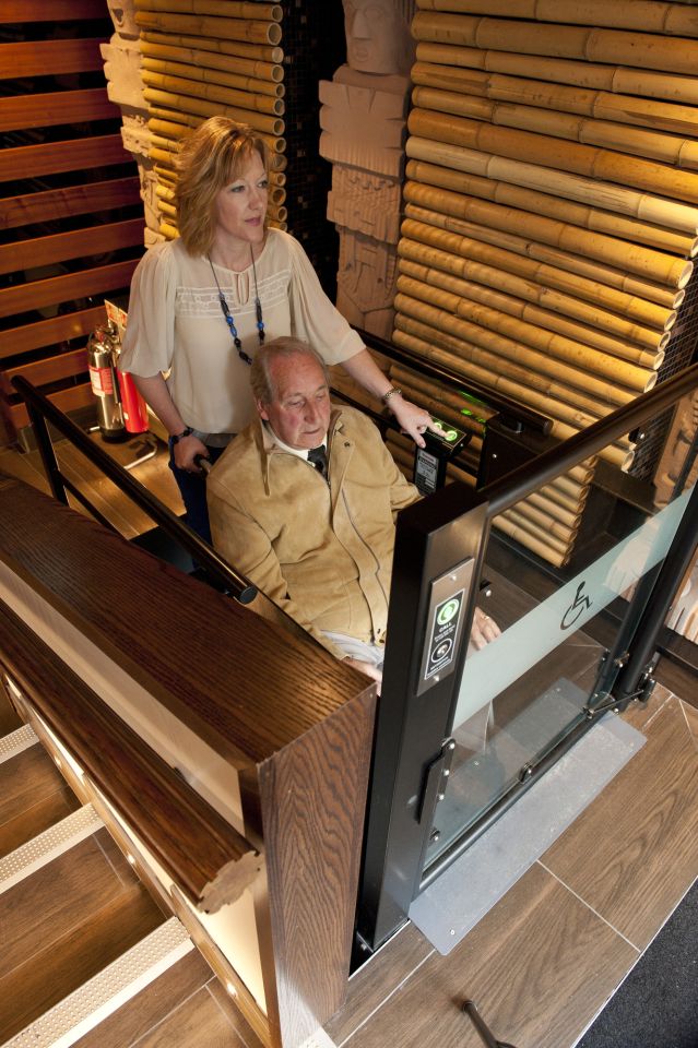 Stannah Lowriser vertical platform lift improves access in Bournemouth restaurant