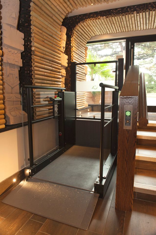 Stannah Lowriser vertical platform lift improves access in Bournemouth restaurant