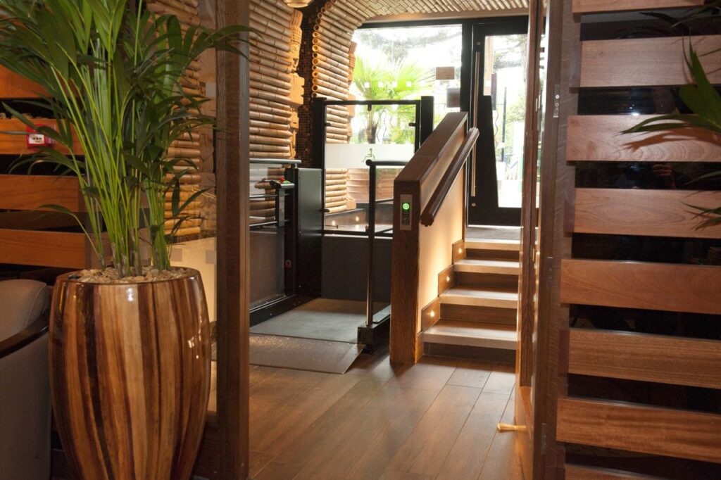 Stannah Lowriser vertical platform lift improves access in Bournemouth restaurant