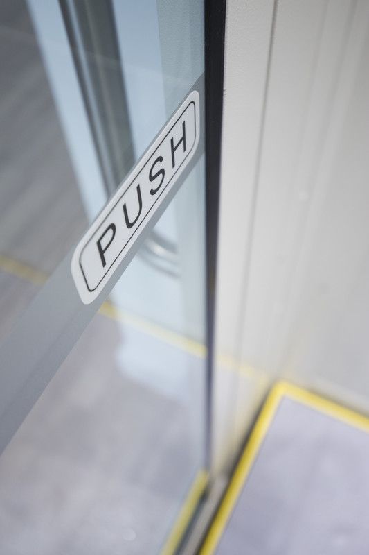 Push symbol on door