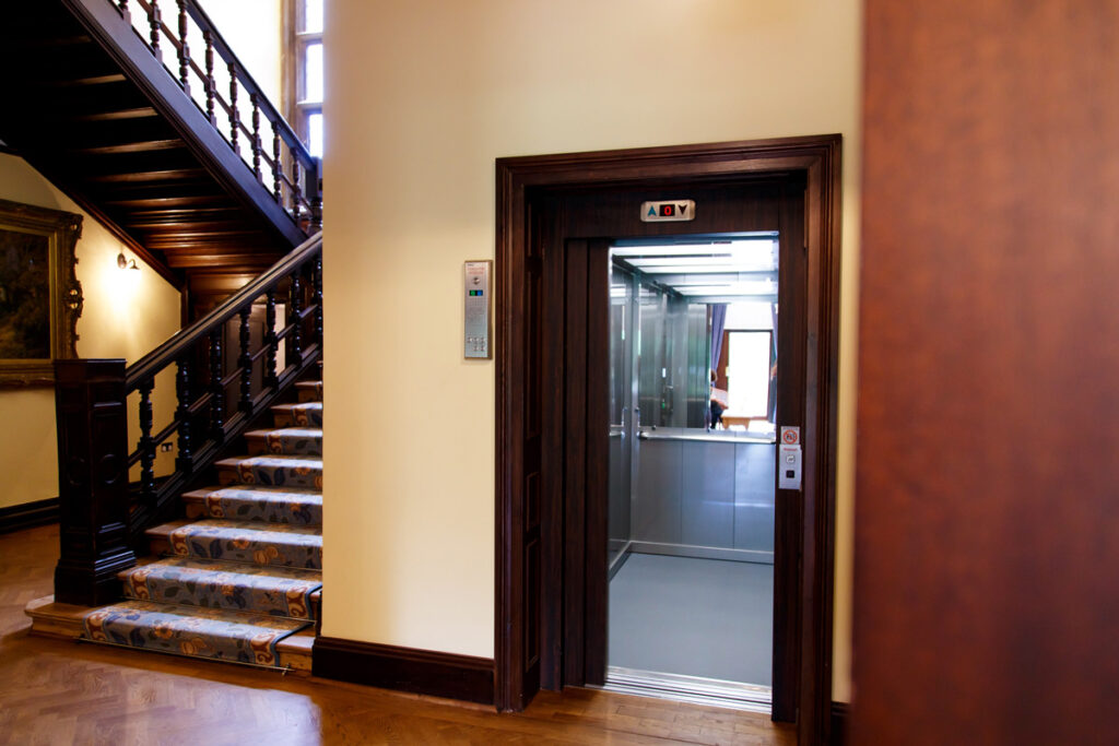 Evacuation lift with bespoke landing finishes at Wardown Museum, Luton.