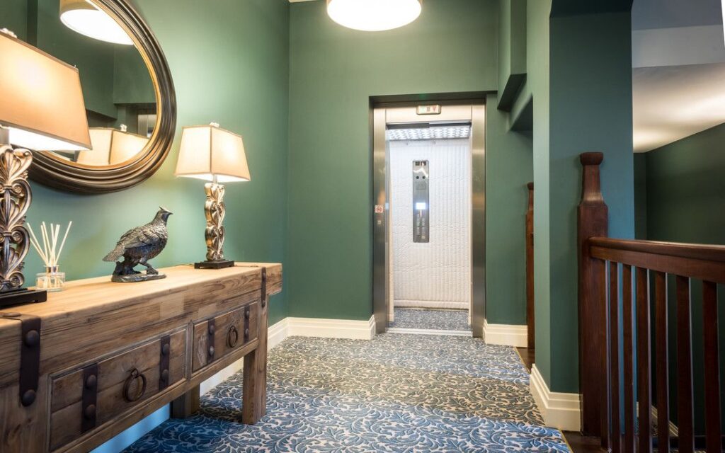 Lift car drapes in place to protect the special finishes of the lift car whilst residents moved in.